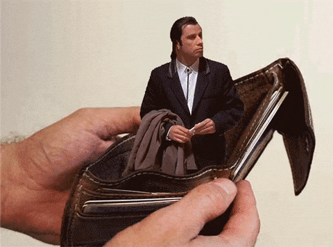 A GIF with John Travolta in an empty looking around, meaning there's no money.